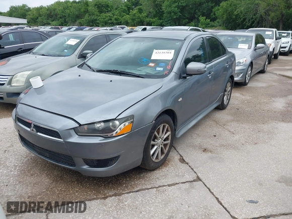 2016 Mitsubishi Lancer ES with VIN JA32U2FU4GU008977, listed as a IAAI auction lot 42139304 with 145,521 mi miles. Bid and sale history available at carsss.com. Image 2.