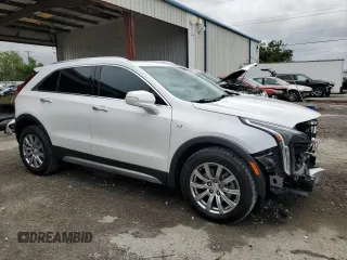 2023 Cadillac XT4 FWD Premium Luxury z VIN 1GYFZCR44PF105116, wystawiony jako Copart lot #51945915 z przebiegiem 20 669 mil mil oraz Szkoda całkowita • Salvage title. Historia ofert i sprzedaży dostępna na DreamBid. Obrazek 4.