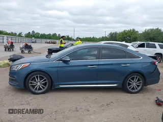 2015 Hyundai Sonata Sport with VIN 5NPE34AB5FH163825, listed as a IAAI auction lot 42013743 with Not Provided miles and . Bid and sale history available at carsss.com. Image 15.