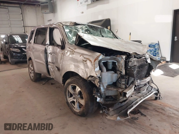 2014 Honda Pilot EX-L with VIN 5FNYF3H56EB024735, listed as a IAAI auction lot 41286284 with 101,221 mi miles. Bid and sale history available at carsss.com. Image 1.