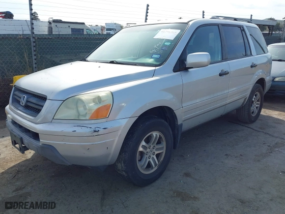 2004 Honda Pilot EX with VIN 2HKYF18514H503083, listed as a IAAI auction lot 41796369 with 172,187 mi miles. Bid and sale history available at carsss.com. Image 2.
