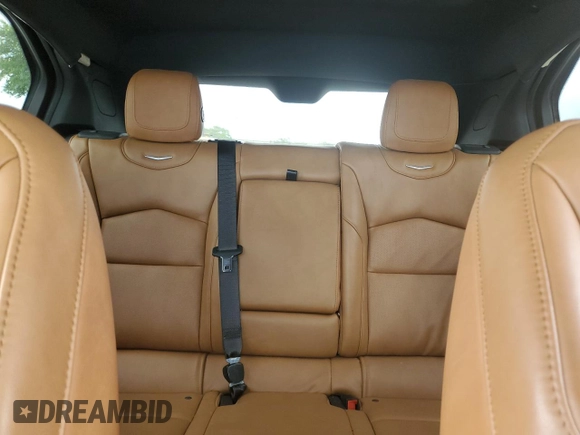 2020 Cadillac XT4 FWD Premium Luxury z VIN 1GYFZCR4XLF005029, wystawiony jako Copart lot #55274025 z przebiegiem 50 550 mil mil oraz Szkoda całkowita • Salvage title. Historia ofert i sprzedaży dostępna na DreamBid. Obrazek 10.