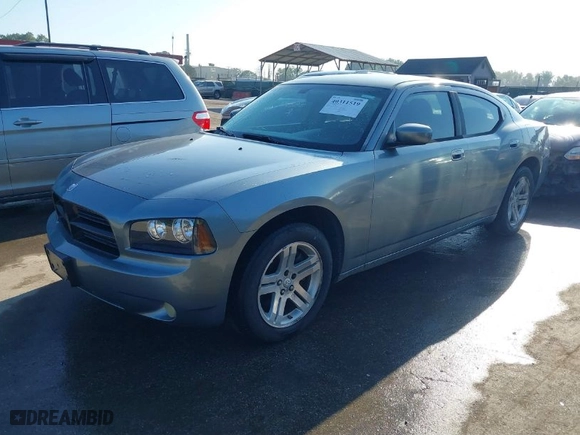 2006 Dodge Charger R/T with VIN 2B3KA53HX6H279600, listed as a IAAI auction lot 40311519 with 273,679 mi miles. Bid and sale history available at carsss.com. Image 2.
