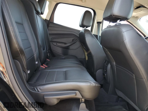 2015 Ford Escape Titanium with VIN 1FMCU0J95FUB59026, listed as a Copart auction lot 65047545 with 84,259 mi miles and Salvage title. Bid and sale history available at DreamBid. Image 11.