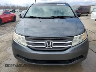 2013 Honda Odyssey EX z VIN 5FNRL5H40DB033400, wystawiony jako Copart lot #50552155 z przebiegiem 223 770 mil mil oraz Nie do naprawy. Historia ofert i sprzedaży dostępna na DreamBid. Obrazek 5.