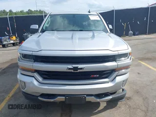 2017 Chevrolet Silverado 1500 LT with VIN 3GCUKREC5HG285689, listed as a IAAI auction lot 42055959 with 128,237 mi miles and . Bid and sale history available at DreamBid. Image 12.