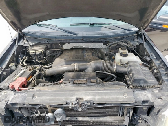 2012 Ford F-150 XL with VIN 1FTFW1ETXCFB32623, listed as a Copart auction lot 54597435 with 210,722 mi miles and Salvage Title. Bid and sale history available at DreamBid. Image 11.