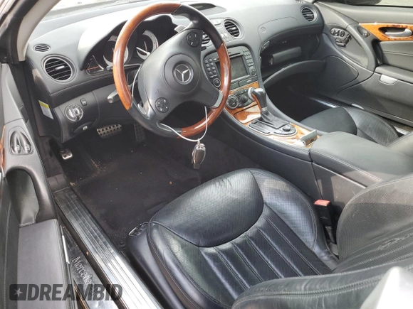 2011 Mercedes-Benz SL 550 with VIN WDBSK7BA6BF161579, listed as a Copart auction lot 78784594 with 112,536 mi miles and Salvage title. Bid and sale history available at DreamBid. Image 8.