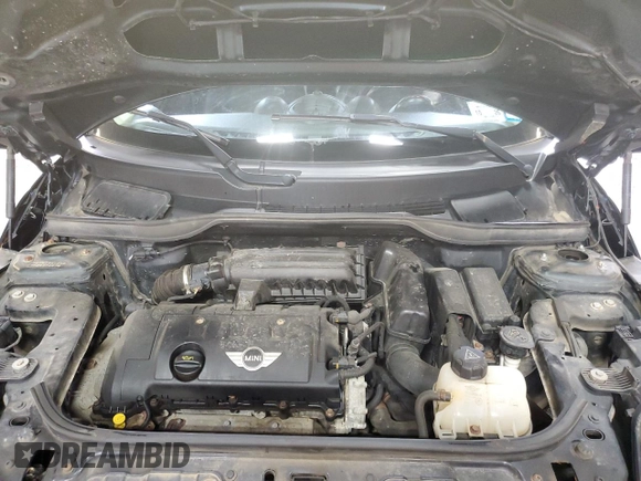 2014 MINI Countryman with VIN WMWZB3C58EWR37237, listed as a Copart auction lot 55596935 with 127,458 mi miles and Salvage Title. Bid and sale history available at DreamBid. Image 11.