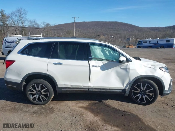 2019 Honda Pilot Touring 7-Passenger with VIN 5FNYF6H66KB073553, listed as a IAAI auction lot 41615538 with 74,882 mi miles. Bid and sale history available at carsss.com. Image 13.