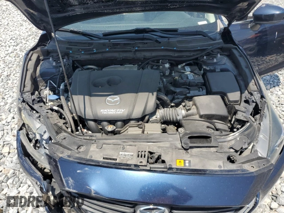 2018 Mazda 3 Touring z VIN 3MZBN1V30JM243211, wystawiony jako Copart lot #58324975 z przebiegiem 86 030 mil mil oraz Szkoda całkowita • Salvage title. Historia ofert i sprzedaży dostępna na DreamBid. Obrazek 11.