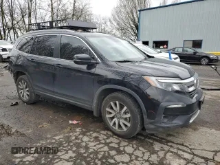2019 Honda Pilot EX-L with VIN 5FNYF5H57KB020071, listed as a Copart auction lot 48979075 with 106,746 mi miles and Salvage Title. Bid and sale history available at DreamBid. Image 4.