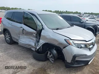 2021 Honda Pilot EX z VIN 5FNYF5H3XMB030112, wystawiony jako IAAI lot #42204148 z przebiegiem 96 182 mil mil oraz . Historia ofert i sprzedaży dostępna na DreamBid. Obrazek 1.