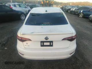 2021 Volkswagen Jetta S z VIN 3VWC57BU1MM017025, wystawiony jako IAAI lot #31656882 z przebiegiem 20 664 mil mil oraz . Historia ofert i sprzedaży dostępna na DreamBid. Obrazek 15.