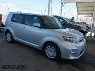 2015 Scion xB with VIN JTLZE4FE4FJ076444, listed as a IAAI auction lot 42025005 with 76,918 mi miles. Bid and sale history available at carsss.com. Image 1.