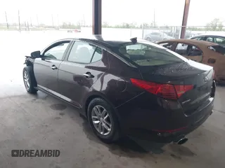 2013 Kia Optima LX with VIN 5XXGM4A76DG252622, listed as a IAAI auction lot 41890887 with 128,002 mi miles and . Bid and sale history available at carsss.com. Image 3.