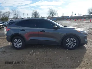 2021 Ford Escape S with VIN 1FMCU9F67MUA84958, listed as a IAAI auction lot 41512185 with 32,917 mi miles and . Bid and sale history available at DreamBid. Image 14.