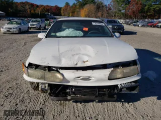 1995 Ford Taurus GL with VIN 1FALP52U6SG103526, listed as a Copart auction lot 77614004 with 58,551 mi miles and Clean Title. Bid and sale history available at carsss.com. Image 5.
