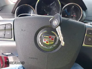 2011 Cadillac CTS with VIN 1G6DC5EY2B0143073, listed as a IAAI auction lot 42322497 with 133,992 mi miles and . Bid and sale history available at DreamBid. Image 11.