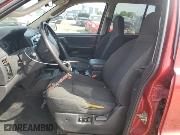 2004 Jeep Grand Cherokee Laredo z VIN 1J4GW48S24C220989, wystawiony jako Copart lot #56759465 z przebiegiem 227 612 mil mil oraz Szkoda całkowita • Salvage title. Historia ofert i sprzedaży dostępna na DreamBid. Obrazek 7.