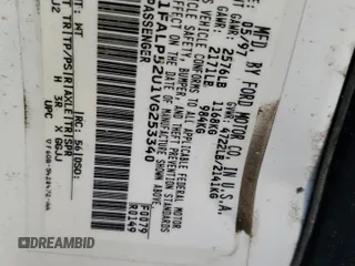 1997 Ford Taurus GL z VIN 1FALP52U1VG253340, wystawiony jako Copart lot #44081395 z przebiegiem 210 117 mil mil oraz Szkoda całkowita • Salvage title. Historia ofert i sprzedaży dostępna na DreamBid. Obrazek 13.