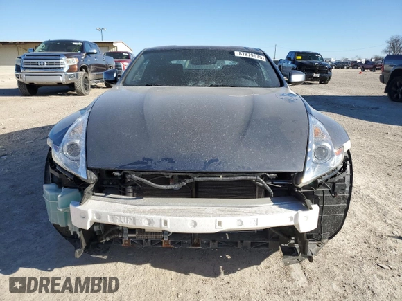 2014 Nissan 370Z Nismo with VIN JN1AZ4EH6EM633797, listed as a Copart auction lot 87879675 with 21,410 mi miles and Salvage Title. Bid and sale history available at DreamBid. Image 5.