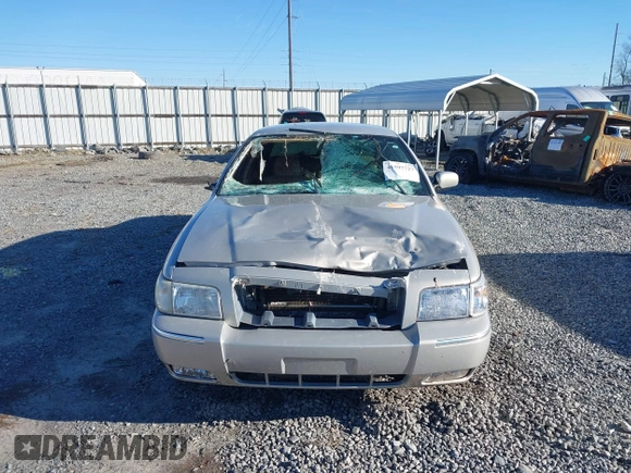 2010 Mercury Grand Marquis LS z VIN 2MEBM7FV2AX635506, wystawiony jako IAAI lot #41597727 z przebiegiem Nie podano mil oraz . Historia ofert i sprzedaży dostępna na DreamBid. Obrazek 11.