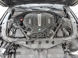 2013 BMW 7 Series 750i with VIN WBAYA8C56DC996704, listed as a Copart auction lot 64466705 with 102,278 mi miles and Salvage title. Bid and sale history available at DreamBid. Image 11.