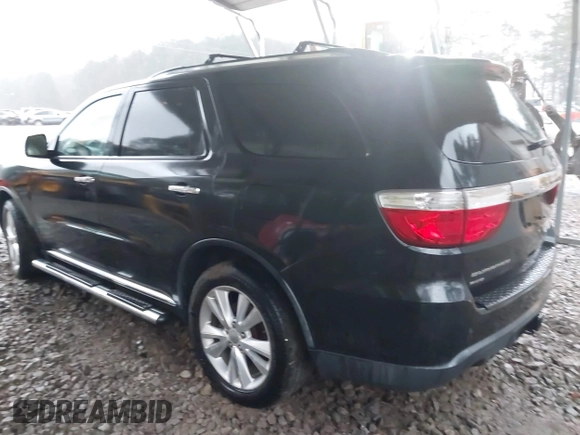 2013 Dodge Durango Crew with VIN 1C4SDJDT3DC509611, listed as a IAAI auction lot 41729805 with 161,357 mi miles. Bid and sale history available at carsss.com. Image 3.