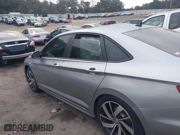 2019 Volkswagen Jetta GLI S z VIN 3VW5T7BU4KM165083, wystawiony jako IAAI lot #40729763 z przebiegiem 75 414 mil mil oraz . Historia ofert i sprzedaży dostępna na DreamBid. Obrazek 14.