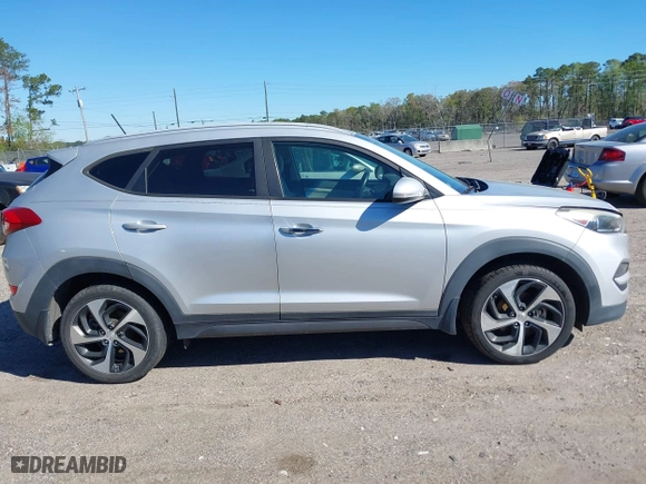 2016 Hyundai Tucson Sport with VIN KM8J33A25GU224084, listed as a IAAI auction lot 41827851 with 153,348 mi miles. Bid and sale history available at carsss.com. Image 13.