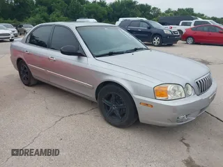 2003 Kia Optima LX with VIN KNAGD128235248556, listed as a IAAI auction lot 42366002 with 140,904 mi miles and . Bid and sale history available at DreamBid. Image 1.