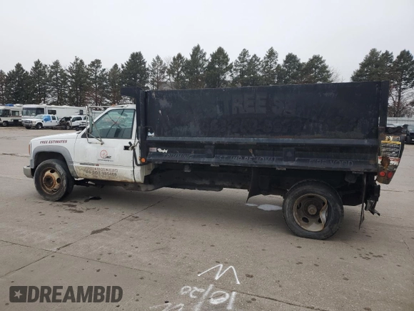 2001 GMC Sierra 1500 with VIN 3GDKC34GX1M100674, listed as a Copart auction lot 43498685 with 140,259 mi miles and Salvage Title. Bid and sale history available at DreamBid. Image 2.