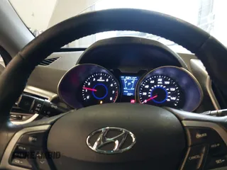 2013 Hyundai Veloster w/Black Int with VIN KMHTC6AD2DU128534, listed as a IAAI auction lot 41791398 with 158,414 mi miles and . Bid and sale history available at DreamBid. Image 7.