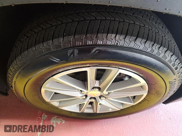 2022 Chevrolet Traverse LT Cloth z VIN 1GNEVGKW2NJ154512, wystawiony jako IAAI lot #42569716 z przebiegiem 84 735 mil mil oraz . Historia ofert i sprzedaży dostępna na DreamBid. Obrazek 13.