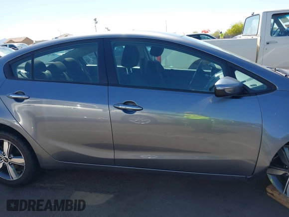 2018 Kia Forte LX with VIN 3KPFL4A77JE220538, listed as a IAAI auction lot 42095964 with 98,977 mi miles and . Bid and sale history available at DreamBid. Image 13.