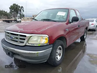 2003 Ford F-150 XL with VIN 1FTRX172X3NA92032, listed as a IAAI auction lot 41725879 with 1 mi miles. Bid and sale history available at carsss.com. Image 2.