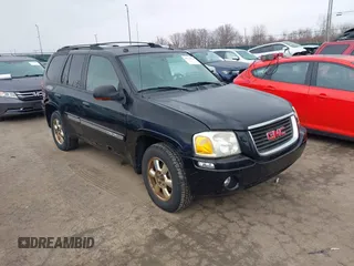 2005 GMC Envoy SLT with VIN 1GKDT13S752296467, listed as a IAAI auction lot 41731562 with 188,873 mi miles. Bid and sale history available at carsss.com. Image 1.