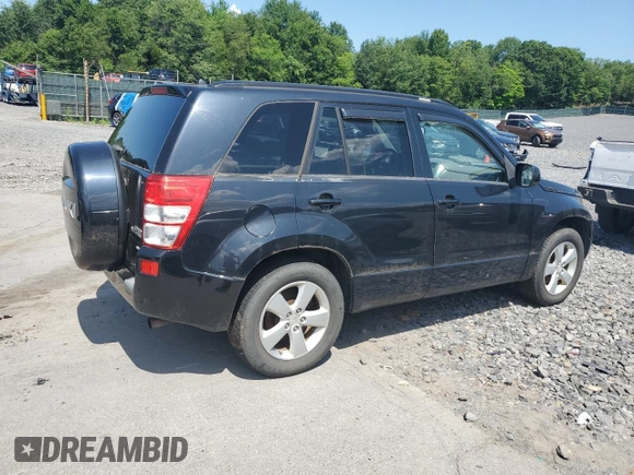 2009 Suzuki Grand Vitara with VIN JS3TD047994100405, listed as a Copart auction lot 62215355 with 127,756 mi miles and Clean title. Bid and sale history available at DreamBid. Image 3.