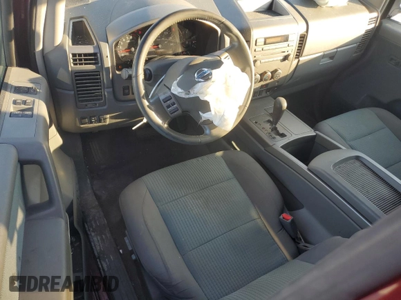 2006 Nissan Titan SE with VIN 1N6BA06B26N519672, listed as a Copart auction lot 74880744 with 144,568 mi miles and Salvage Title. Bid and sale history available at DreamBid. Image 8.
