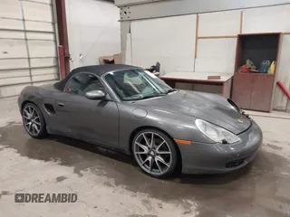 2002 Porsche Boxster z VIN WP0CA29892U620999, wystawiony jako IAAI lot #41626627 z przebiegiem 149 512 mil mil oraz . Historia ofert i sprzedaży dostępna na DreamBid. Obrazek 1.