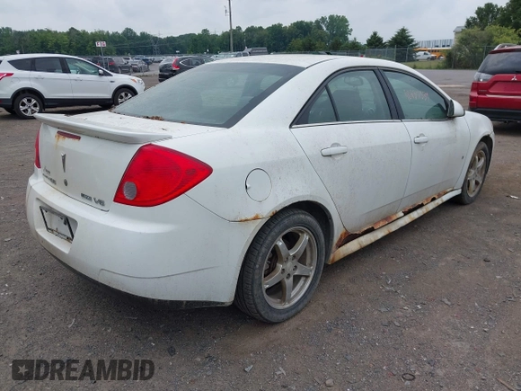 2009 Pontiac G6 1SB with VIN 1G2ZJ57K294240301, listed as a IAAI auction lot 42437339 with 138,984 mi miles and . Bid and sale history available at DreamBid. Image 4.