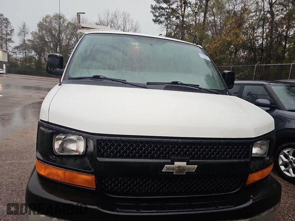 2014 Chevrolet Express Cargo Van with VIN 1GCWGFCA8E1121017, listed as a IAAI auction lot 41944246 with 216,471 mi miles. Bid and sale history available at carsss.com. Image 1.