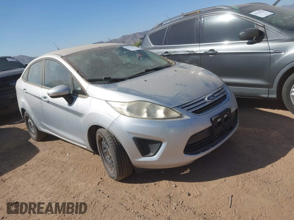 2013 Ford Fiesta SE z VIN 3FADP4BJ7DM165174, wystawiony jako IAAI lot #42311167 z przebiegiem 90 592 mil mil oraz . Historia ofert i sprzedaży dostępna na DreamBid. Obrazek 1.