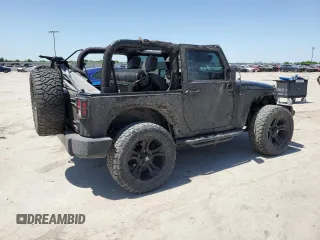 2015 Jeep Wrangler Sport with VIN 1C4GJWAG8FL563198, listed as a Copart auction lot 52867385 with 47,854 mi miles and Salvage title. Bid and sale history available at DreamBid. Image 3.