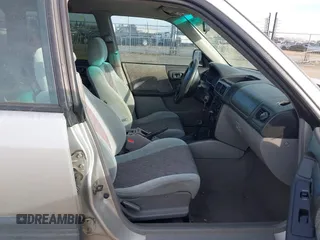 2000 Subaru Forester L with VIN JF1SF6355YH721788, listed as a IAAI auction lot 41736026 with 305,157 mi miles. Bid and sale history available at carsss.com. Image 5.