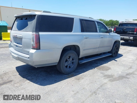 2016 GMC Yukon XL Denali with VIN 1GKS2HKJXGR423556, listed as a IAAI auction lot 42145970 with 118,436 mi miles. Bid and sale history available at carsss.com. Image 4.