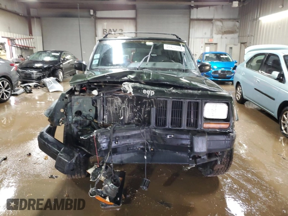 1998 Jeep Cherokee Sport with VIN 1J4FJ68S3WL146331, listed as a Copart auction lot 49420995 with 200,040 mi miles and Salvage Title. Bid and sale history available at carsss.com. Image 5.