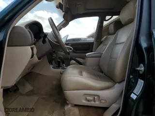 1999 Toyota Land Cruiser with VIN JT3HT05J1X0051145, listed as a Copart auction lot 51969335 with 289,702 mi miles and Salvage Title. Bid and sale history available at carsss.com. Image 7.