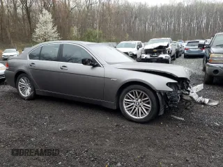 2004 BMW 7 Series 745i with VIN WBAGL63424DP68405, listed as a Copart auction lot 51768045 with 126,048 mi miles and Salvage Title. Bid and sale history available at DreamBid. Image 4.